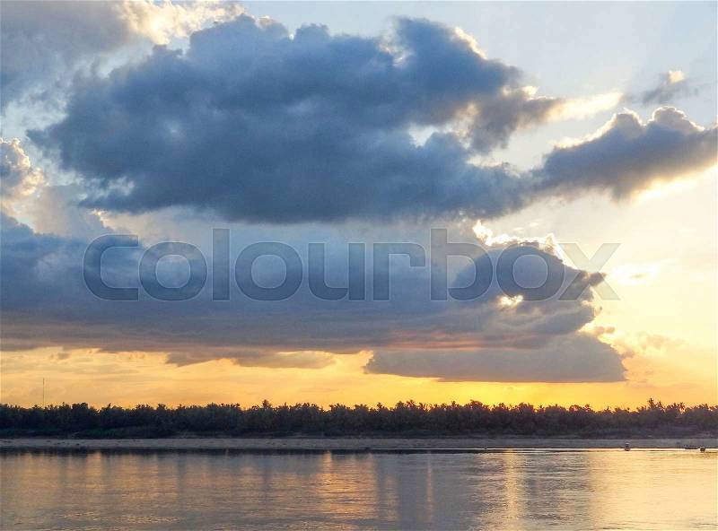 Idyllic scenery at Mekong river in Laos at evening time, stock photo