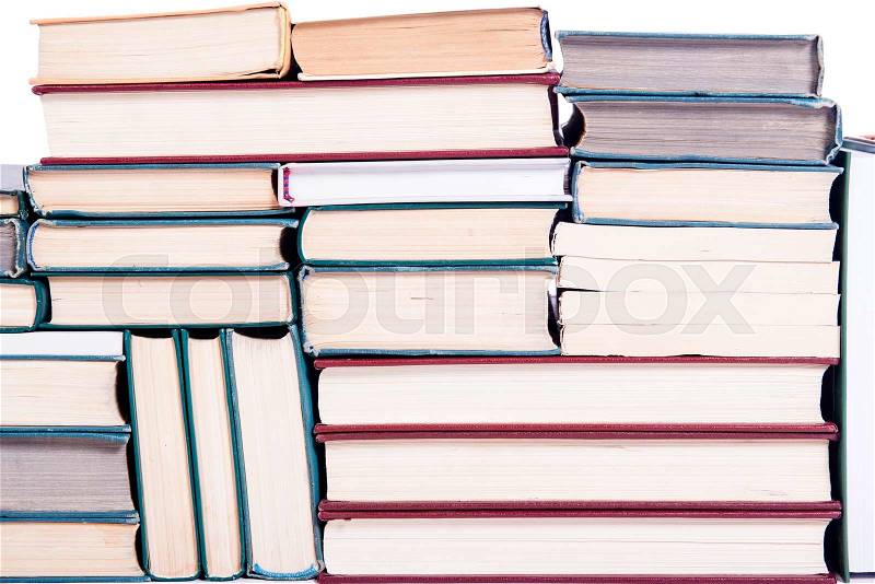 Lots of books arranged as background, stock photo