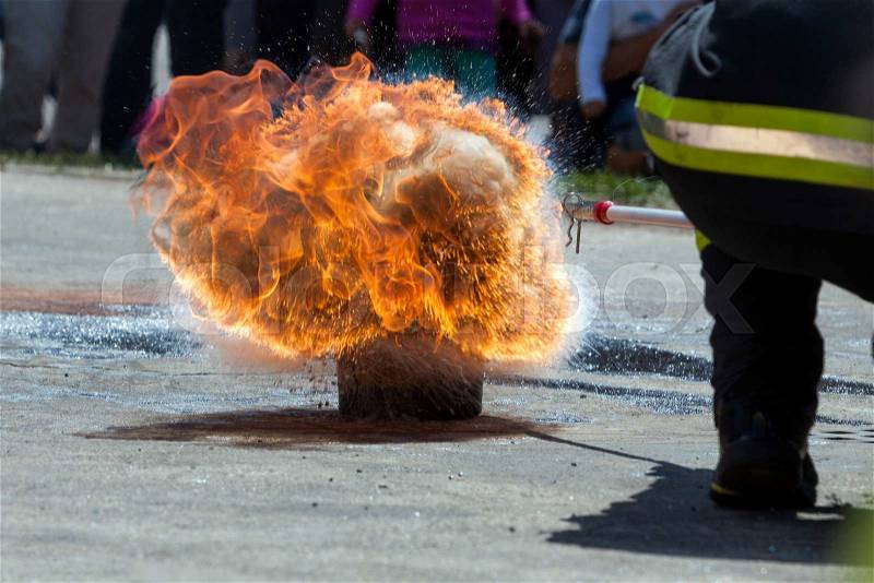 Large fire explosion - attempt response to the hot oil and water, stock photo