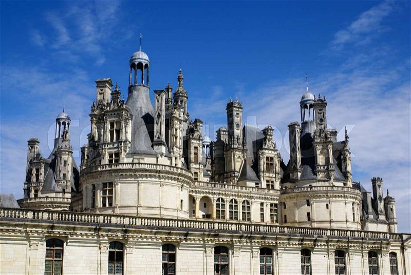Chambord castle is located in Loir-et-Cher, France. It has a very distinct French Renaissance architecture which blends traditional French medieval, stock photo