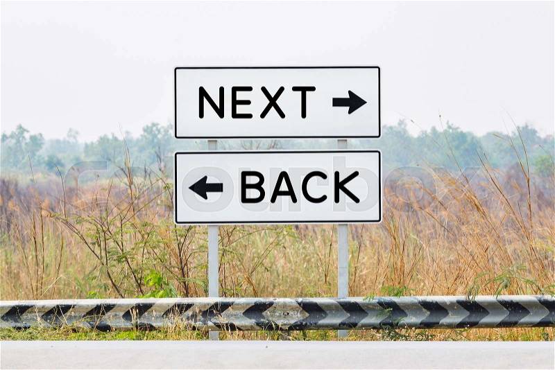 Road sign boards with next and back text, opposite wording concept, stock photo