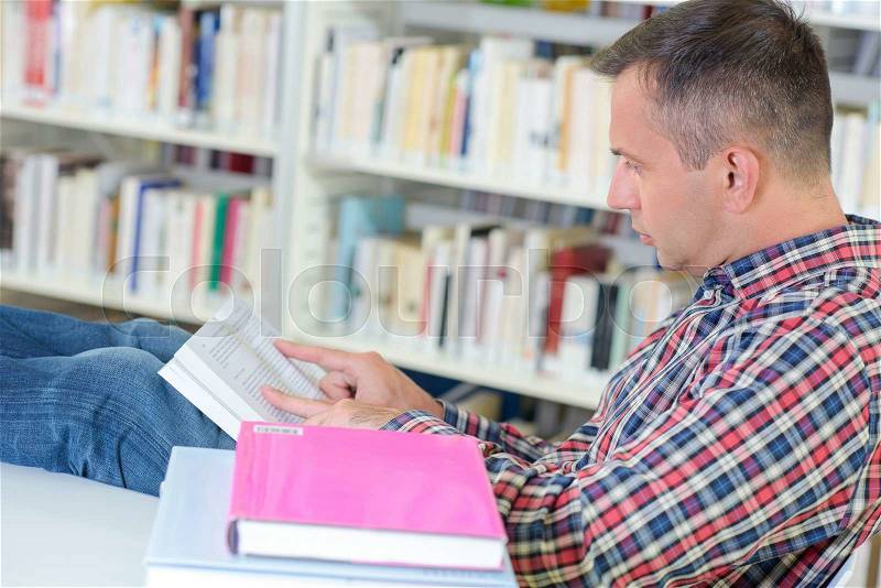 Busy reading book, stock photo