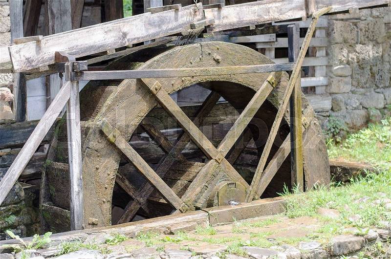 Old wooden water mill, stock photo