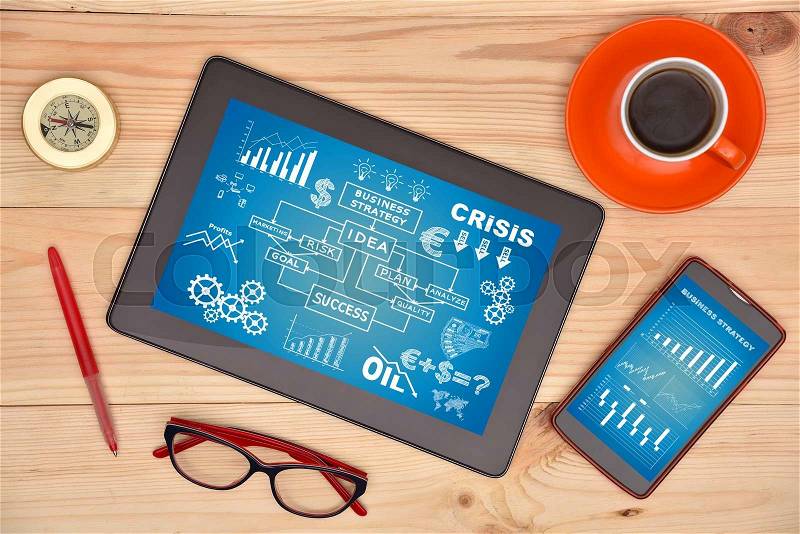 Touch pad with solution concept on screen, glasses and cup of coffee on wooden desk, stock photo