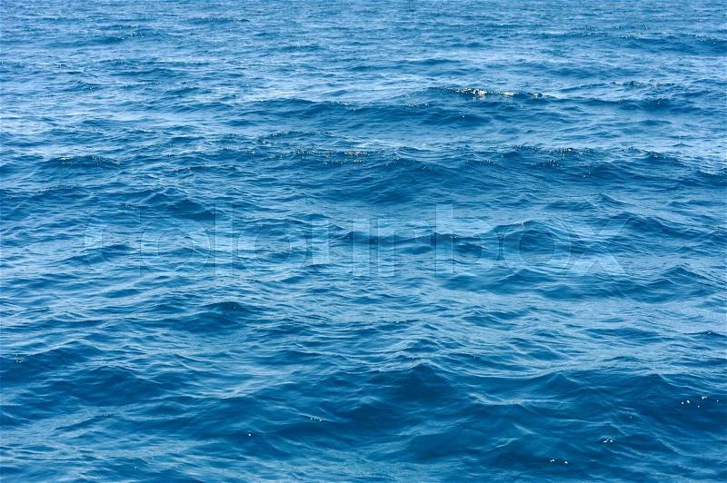 Ocean water surface texture. Deep sea waves, stock photo