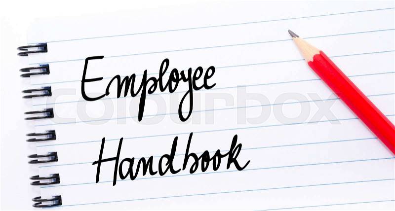Employee Handbook written on notebook page with red pencil on the right, stock photo