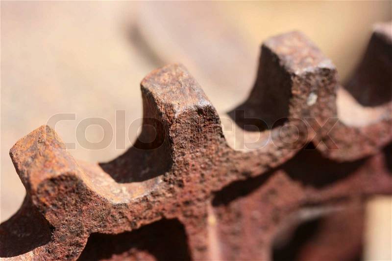 Old industrial detail - a cogwheel for progress transfer, stock photo