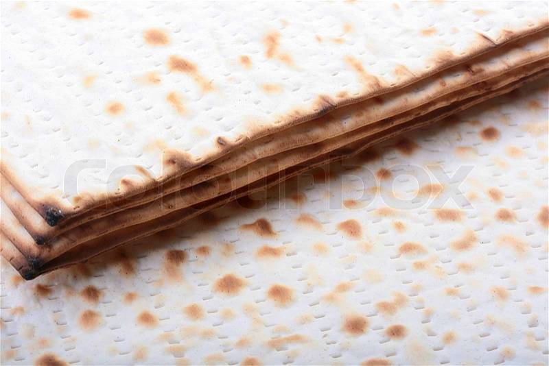 Matza - Jewish national and religious meal on a white background, stock photo