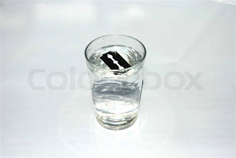 The edge floats in a glass, stock photo