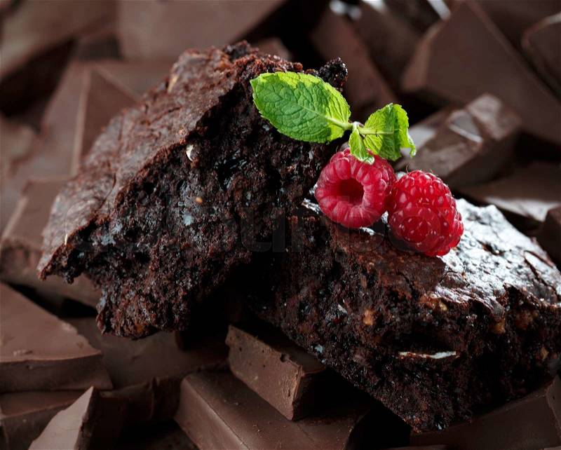 Chocolate brownies with raspberry and chunks of chocolate, stock photo
