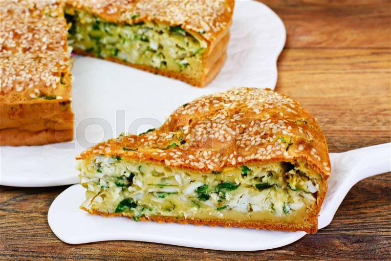 Pie with Green Onions and Eggs Studio Photo, stock photo