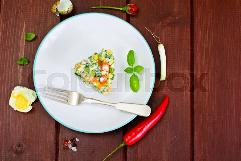 Salad with Corn, Peas, Carrots and Green Onions Studio Photo, stock photo