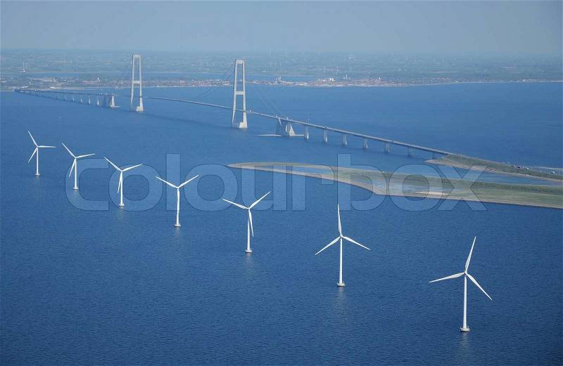 Offshore wind turbines in a row, stock photo