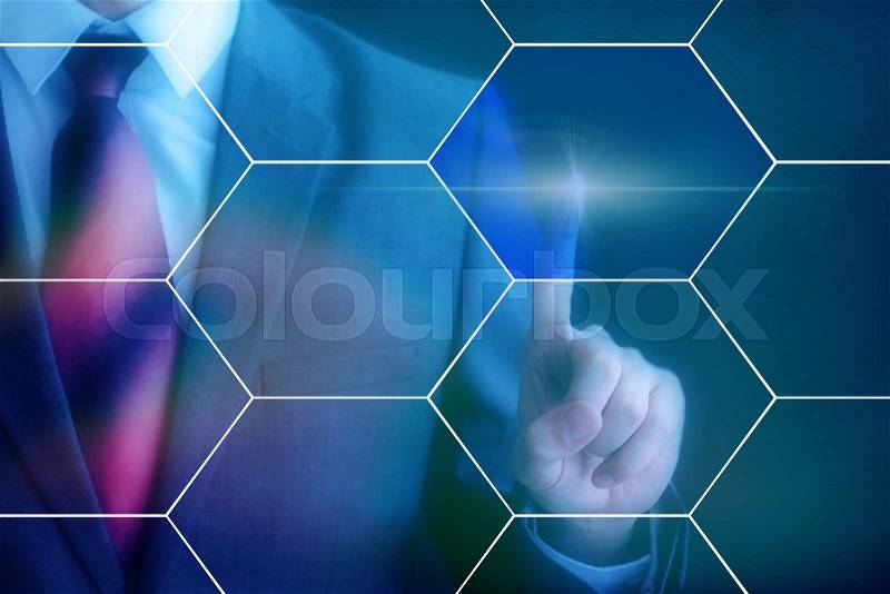 Businessman touching on virtual hexagonal screen with copyspace, stock photo