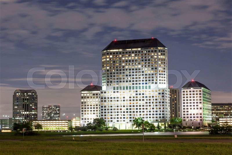 IRVING, TX, USA - APR 18, 2016: Buildings in Las Colinas, Irving illuminated at night. Texas, United States, stock photo