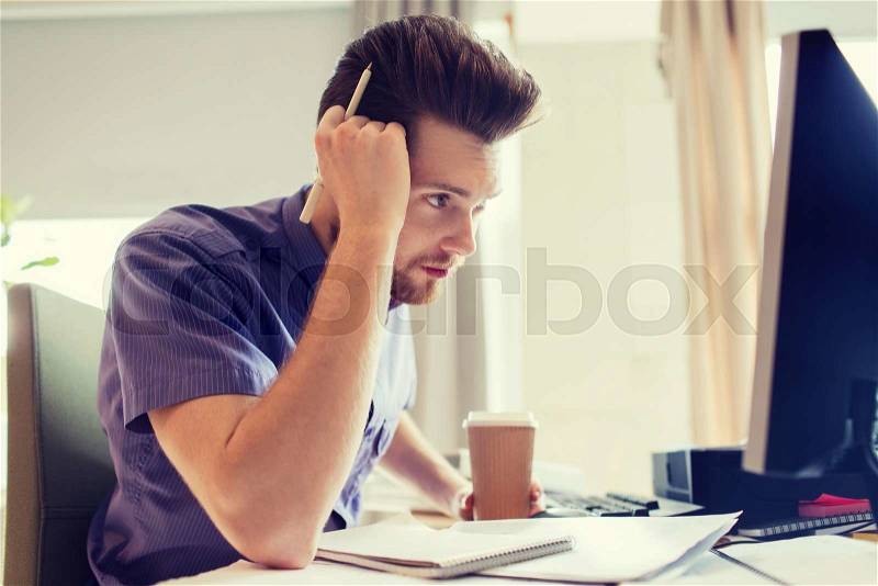 Business, startup and people concept - businessman or creative male office worker drinking coffee and thinking, stock photo