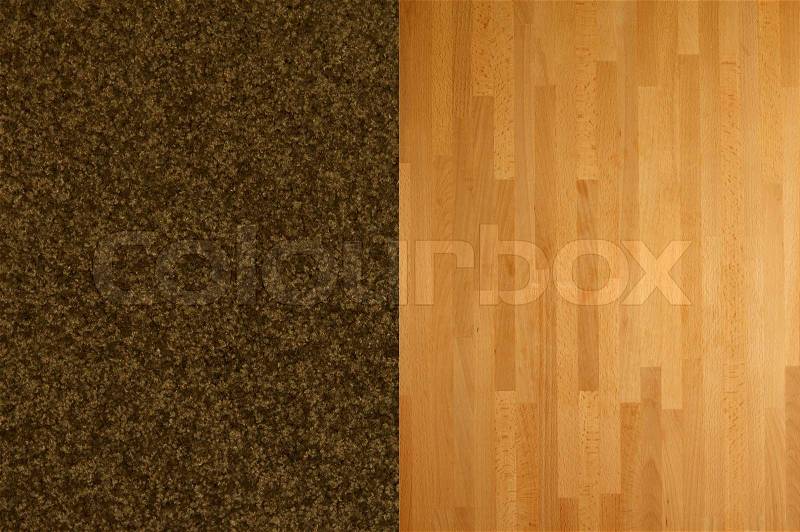 A close shot of plush pile carpet against a wooden floor, stock photo