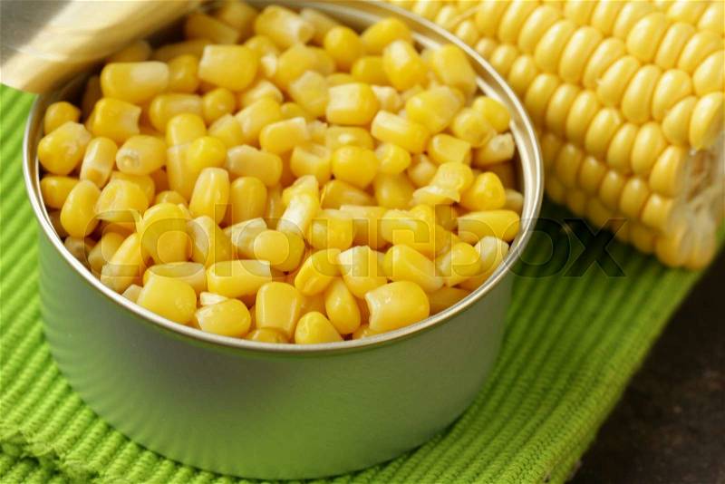 Natural organic canned corn in the pot, stock photo