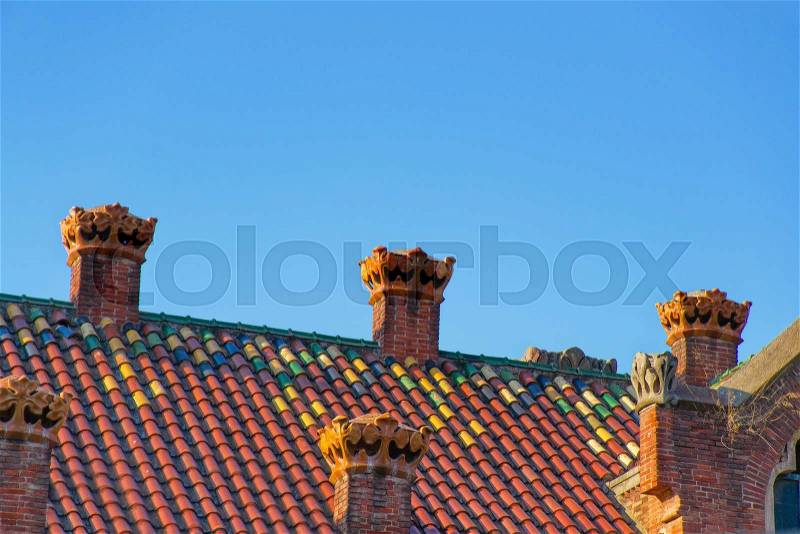Mosaic roof of Hospital de Sant Pau in Barcelona in Spain. In English it is called as Hospital of the Holy Cross and Saint Paul. It used to be a hospital. Now it is a museum, stock photo