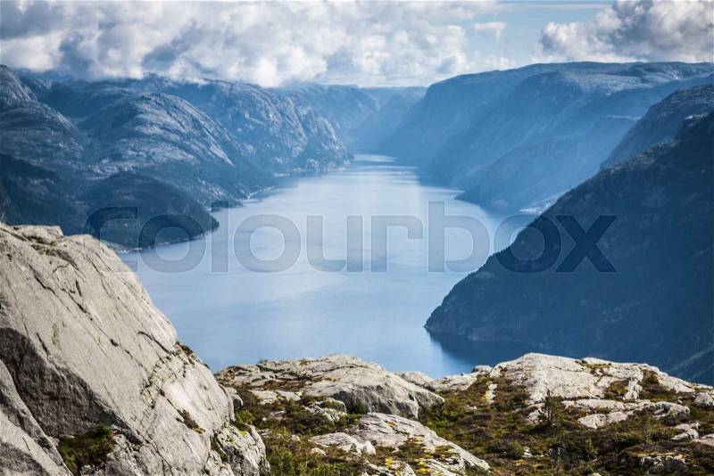 Preikestolen,Pulpit Rock at Lysefjorden (Norway). A well known tourist attraction, stock photo