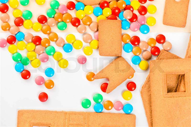 Multi-colored jelly beans and details of the Gingerbread House Closeup, stock photo