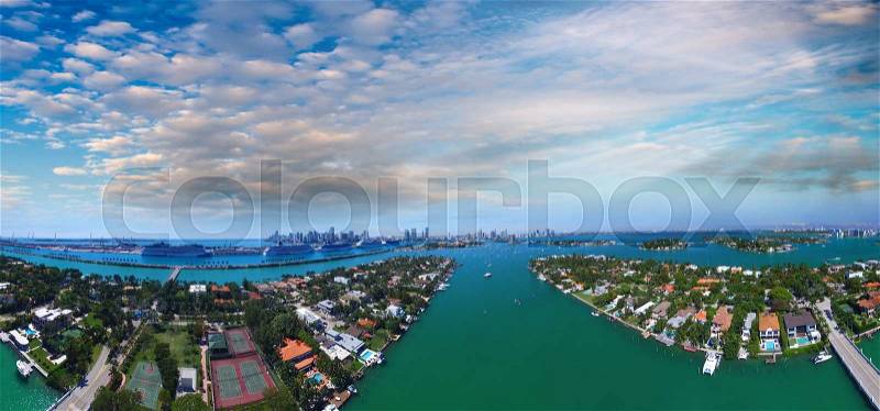 Sunset aerial view of Miami port from helicopter, stock photo
