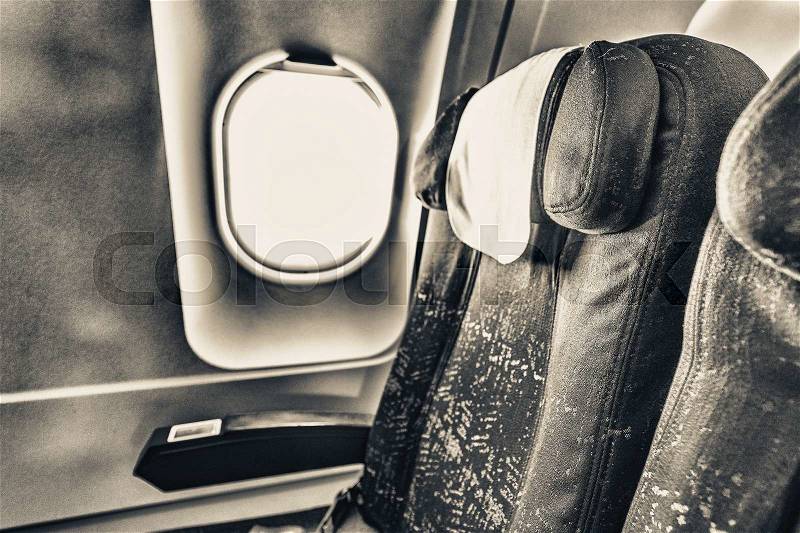 Window seat on a modern airplane, stock photo