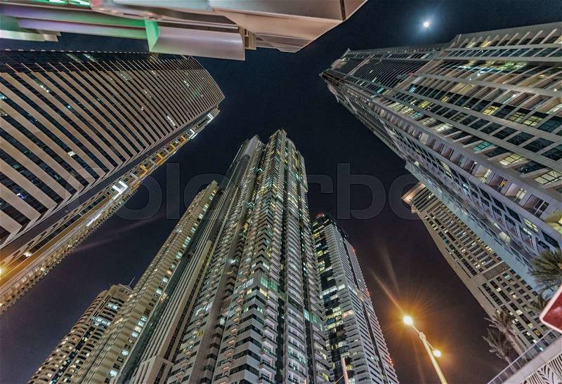 Dubai marina buildings at twilight, UAE, stock photo