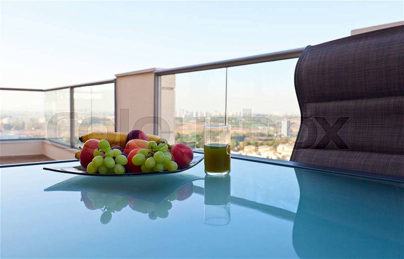 Fruits on a balcony in downtown of modern city, stock photo