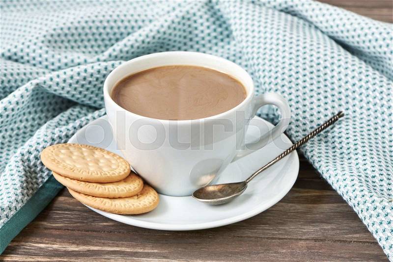 Coffee with milk and cookies on breakfast, stock photo