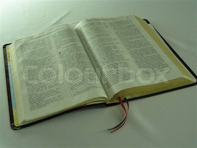On a photo the Bible, with the marked key verses on page is represented. The photo is made in Ukraine, stock photo