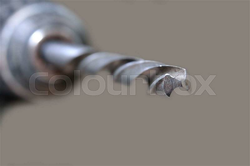 Steel plumbing drill. Variety of tools and instruments close-up. Joinery work, stock photo