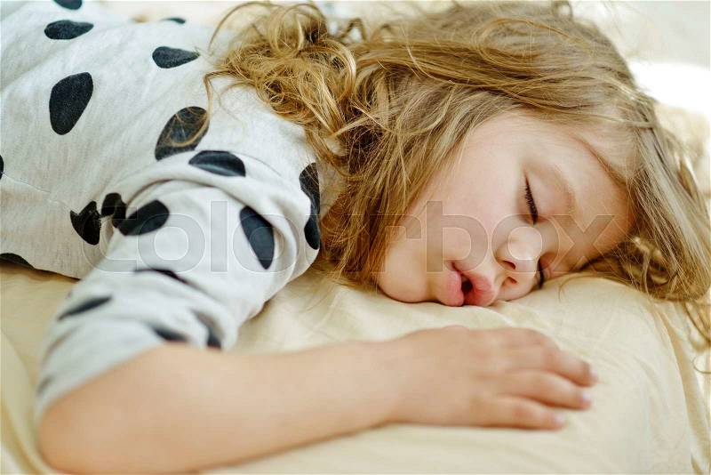 Sweet dreams of the toddler sweet girl , stock photo