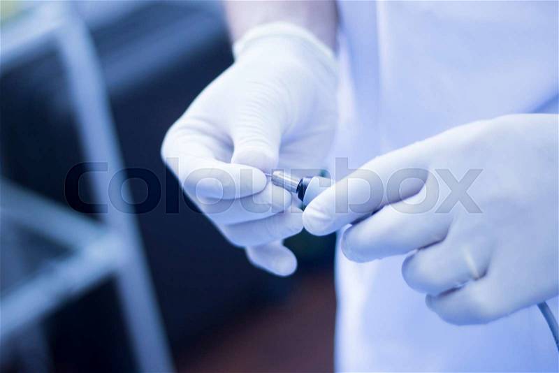 Electroacupunture dry needling needle connecting machine to needles used by acupunturist on patient for acupunture guided by EPI Intratissue Percutaneous Electrolisis, stock photo