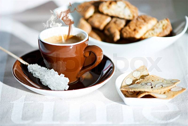 Italian crisp almond cookies cantuccini and black coffee, stock photo