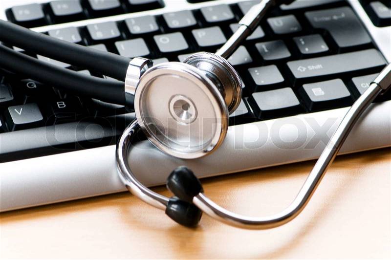 Stethoscope and keyboard illustrating concept of digital security, stock photo