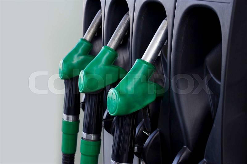 The fuel pumps at a gas station, stock photo