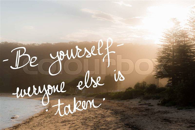 Be Yourself, Everyone Else Is Taken message. Handwritten motivational text over sunset calm sunny beach background with vintage filter applied, stock photo
