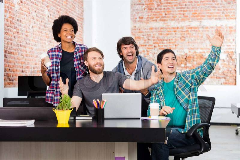 Excited people office diverse mix race group businesspeople surprised happy smile laptop computer casual wear, stock photo