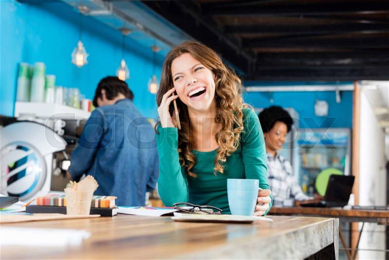 Woman speak smart phone smile coffee break diverse mix race business people group casual wear modern office, stock photo
