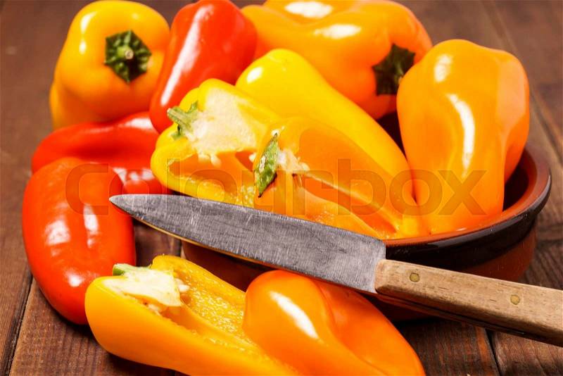 Small bell peppers in red and orange, stock photo