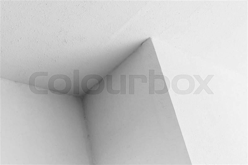 Abstract architecture background, white interior fragment with dark corner, black and white photo, stock photo