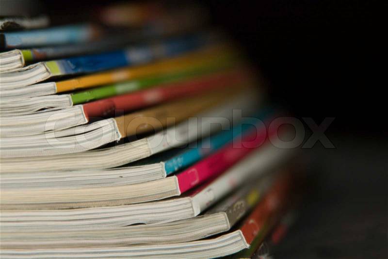 Stack of magazines. Small depth of sharpness, stock photo