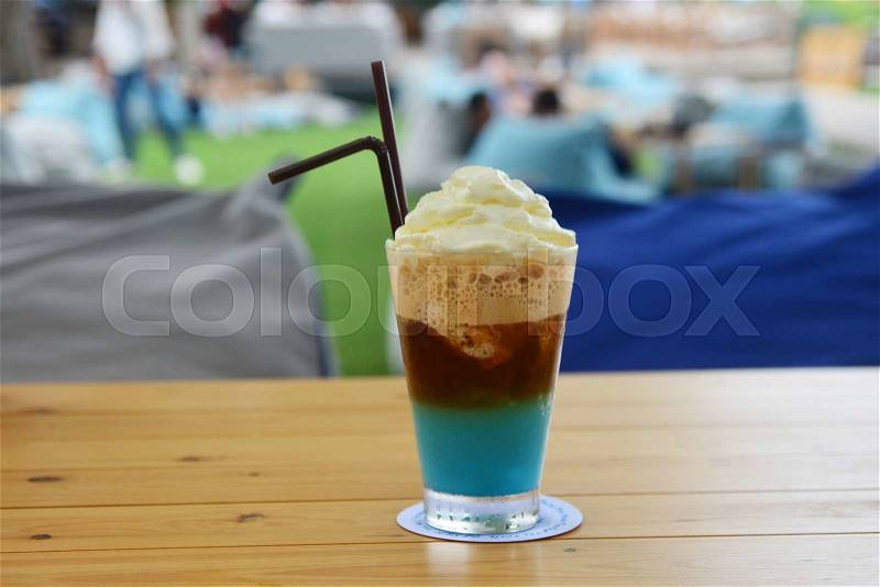 Glass with classic latte coffee cocktail, stock photo
