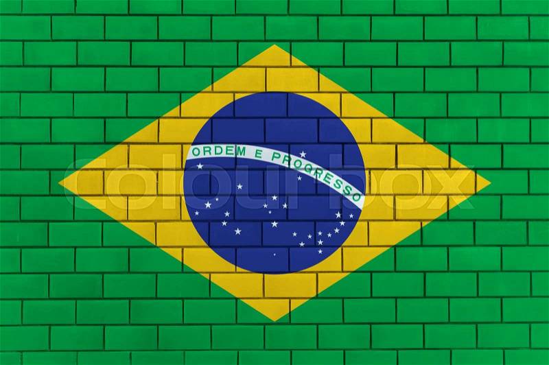 Flag of Brazil painted on brick wall, background texture, stock photo