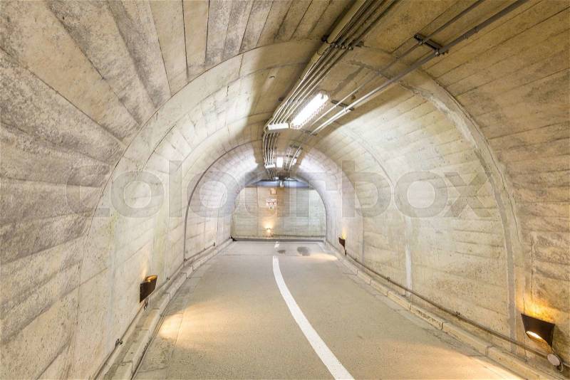 Interior of an urban walkway tunnel road, stock photo