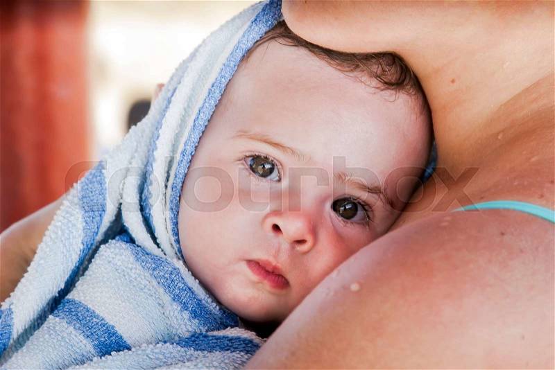 Mother and baby closeup portrait, family picture, adorable small girl, stock photo