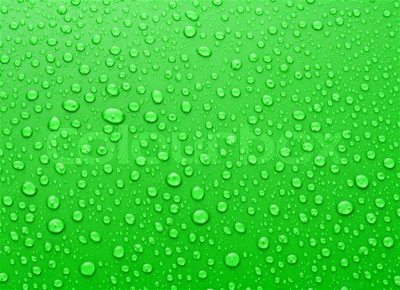 Beautiful green water drops background, stock photo