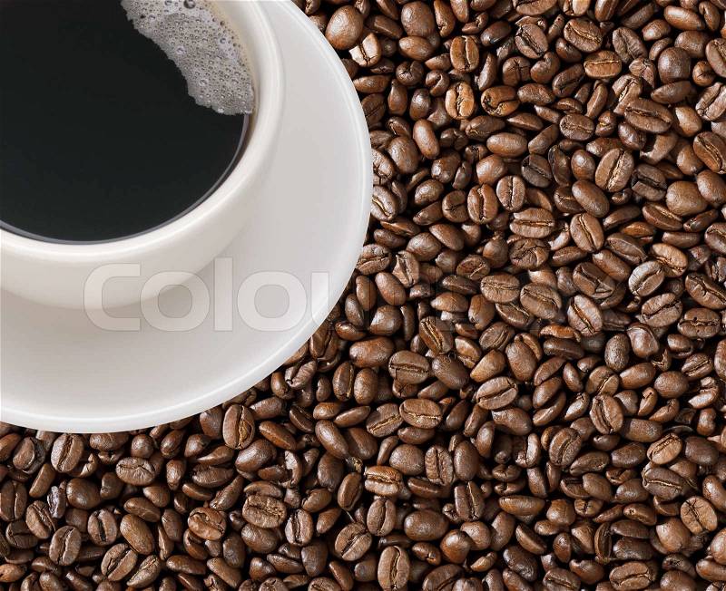 Coffee cup with coffee beans, stock photo