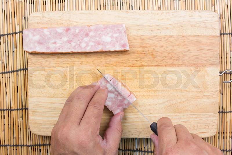 Chef cutting bacon for cooking fired rice / cooking fire rice concept, stock photo